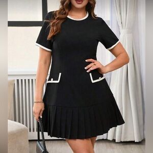 Elegant Black Dress with White Trim ruffled drop waist hem and bow detail